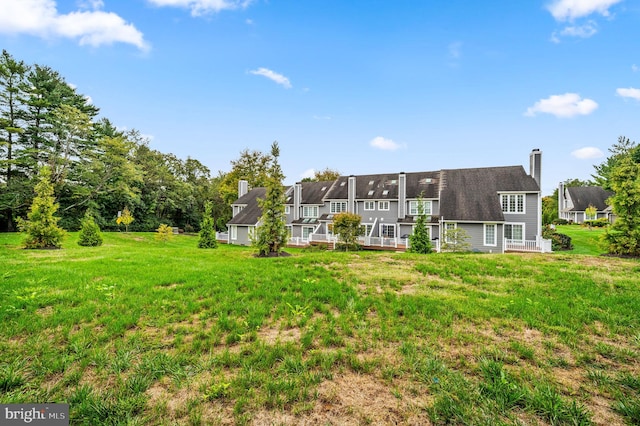 exterior space with a lawn