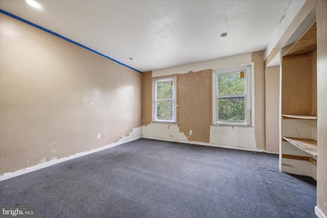 spare room featuring carpet flooring