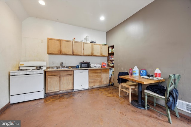 kitchen featuring white appliances, lofted ceiling, sink, and concrete flooring