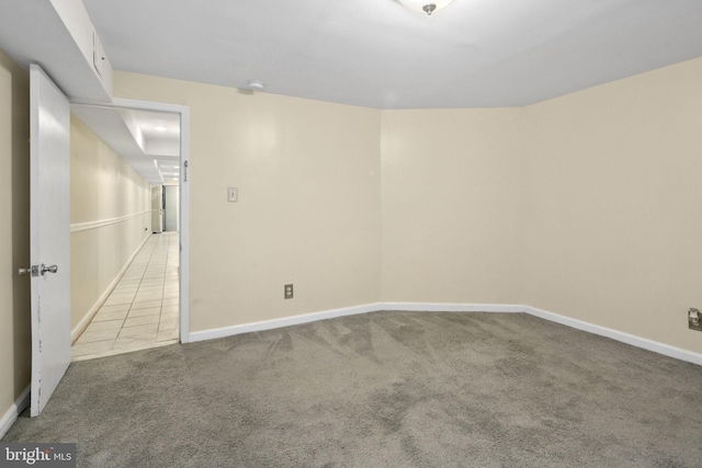 unfurnished room with carpet flooring