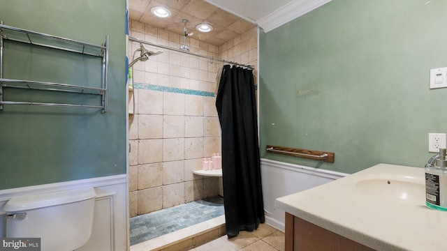 bathroom featuring vanity, walk in shower, ornamental molding, toilet, and tile patterned floors