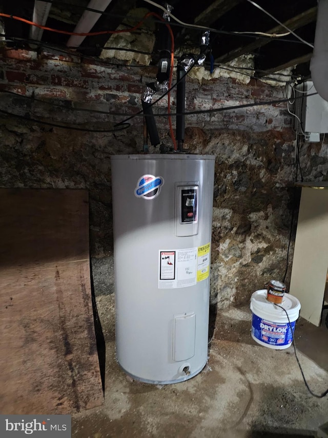 utility room with water heater