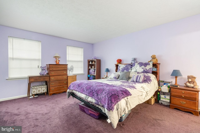 bedroom featuring carpet floors and multiple windows