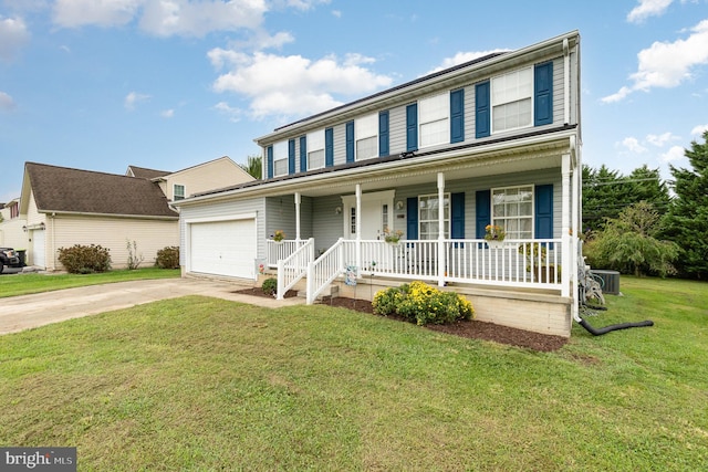 view of front of house with cooling unit, a garage, a front lawn, and covered porch