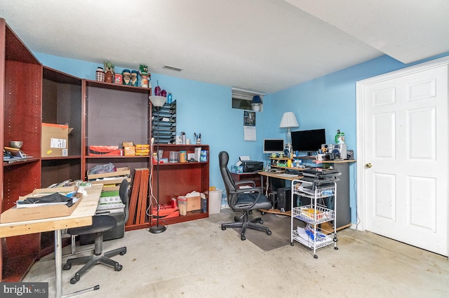 office area with concrete floors