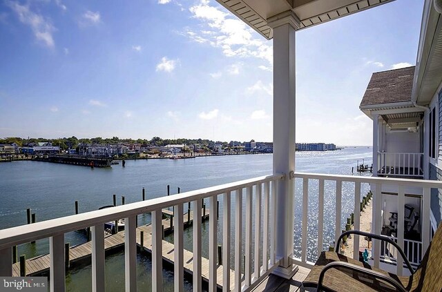 balcony featuring a water view