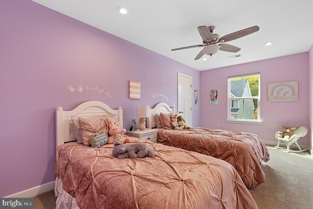 carpeted bedroom with ceiling fan