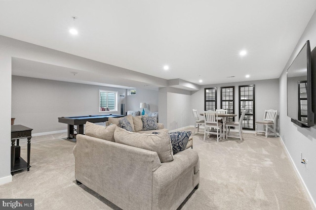 living room with pool table and light colored carpet