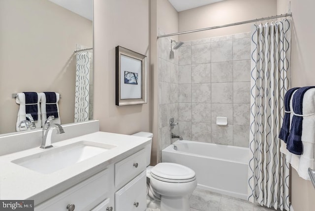 full bathroom with shower / tub combo, vanity, and toilet