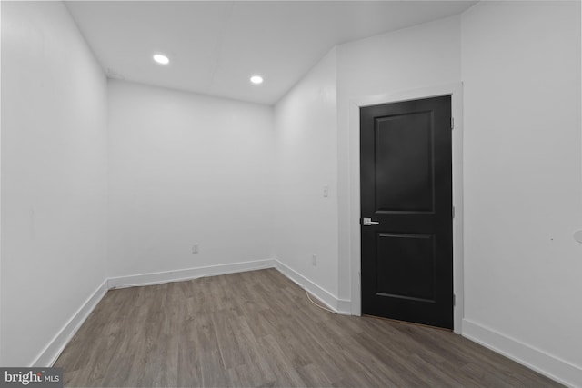 unfurnished room featuring hardwood / wood-style floors