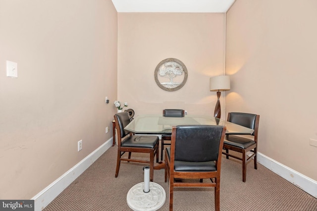 view of carpeted dining room