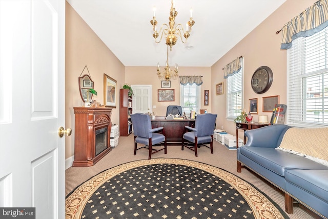 living room featuring a chandelier and carpet flooring