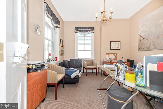 carpeted office space with an inviting chandelier