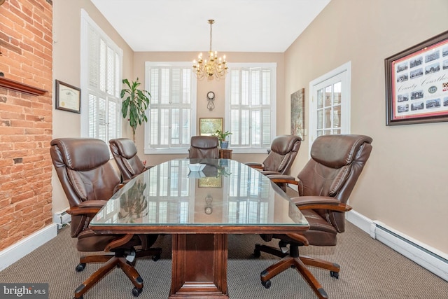 office with baseboard heating, carpet flooring, an inviting chandelier, and brick wall