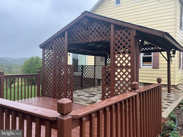 wooden deck with a gazebo