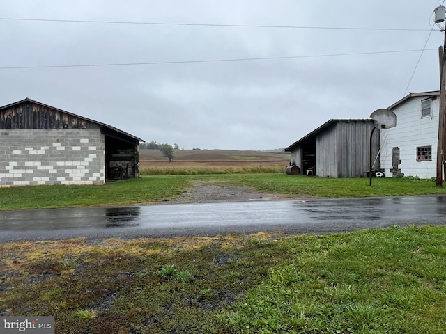 exterior space with an outbuilding