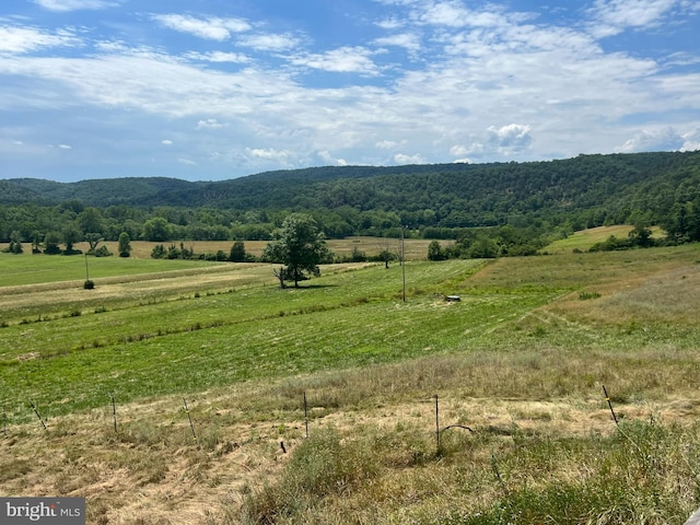 property view of mountains featuring a rural view