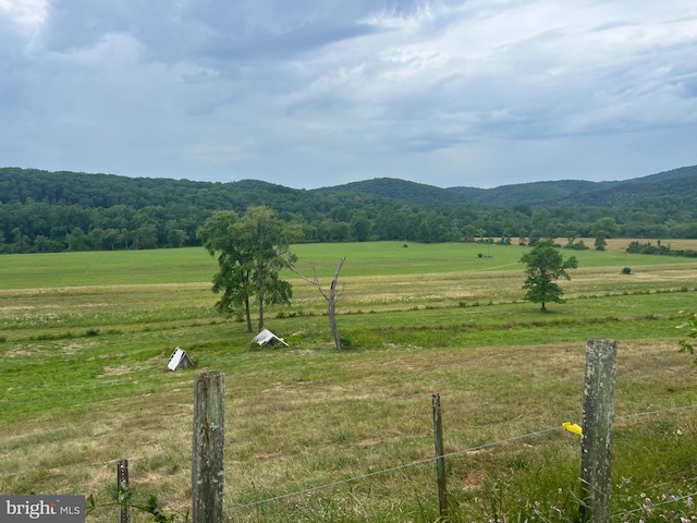 view of mountain feature featuring a rural view