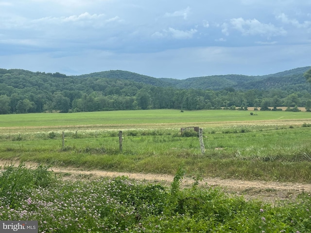 property view of mountains with a rural view