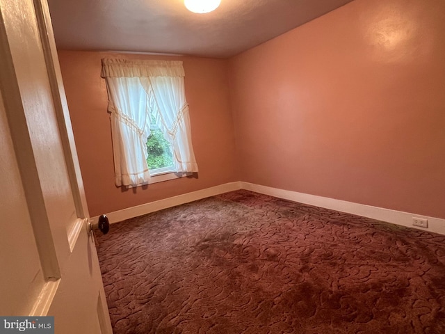 view of carpeted spare room