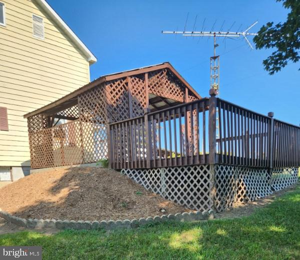 exterior space featuring a wooden deck