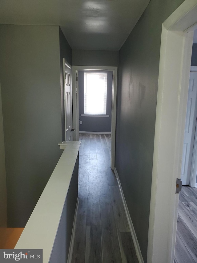 hallway featuring hardwood / wood-style flooring