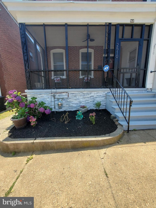 doorway to property featuring covered porch