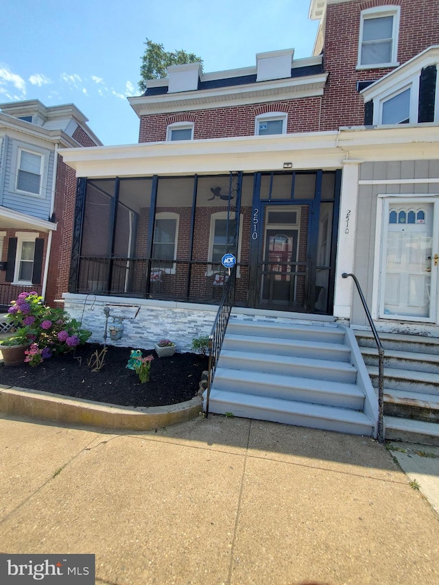 entrance to property with a porch