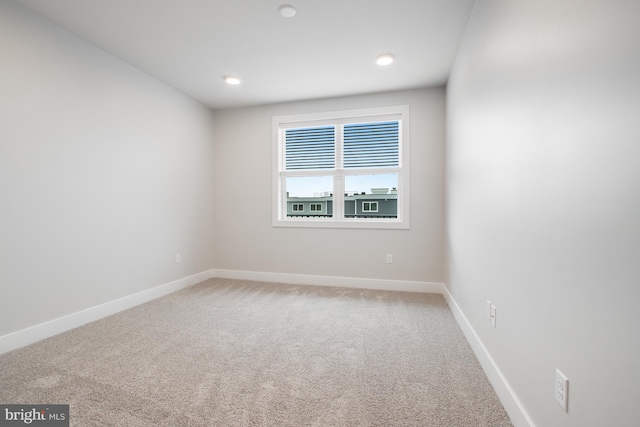 view of carpeted spare room