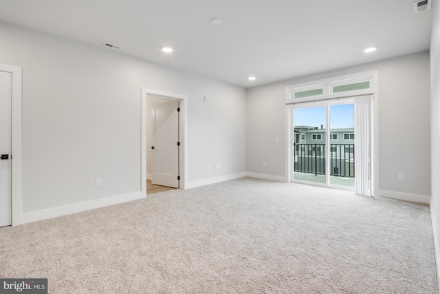 view of carpeted spare room