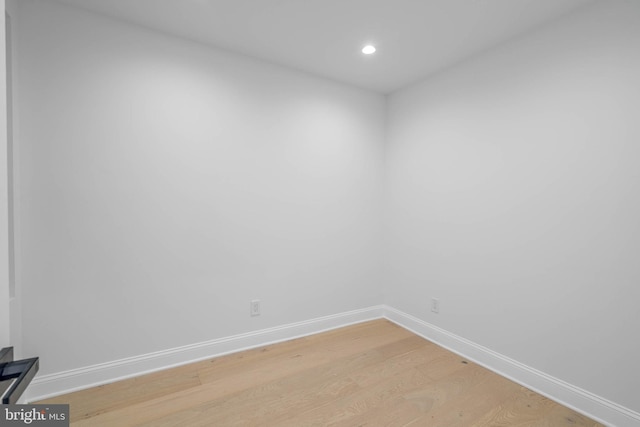 unfurnished room with light hardwood / wood-style flooring