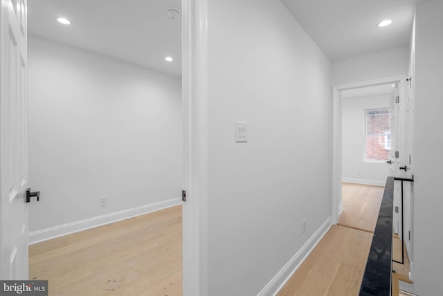 hallway featuring light wood-type flooring