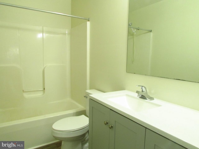 full bathroom with shower / bath combination, vanity, and toilet