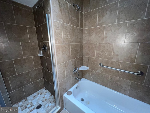 bathroom featuring separate shower and tub