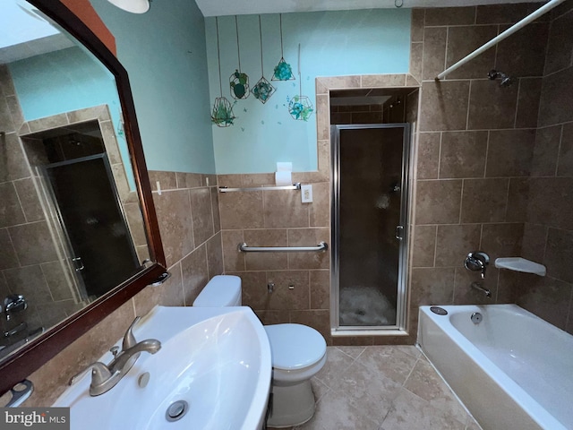 full bathroom with toilet, sink, independent shower and bath, tile walls, and tile patterned flooring