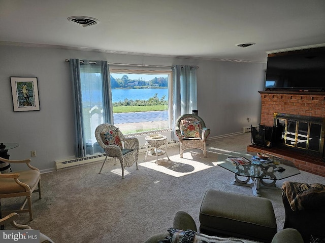 living room with carpet flooring, a fireplace, and crown molding