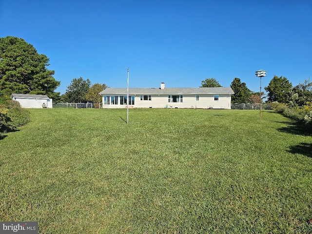 exterior space with a lawn