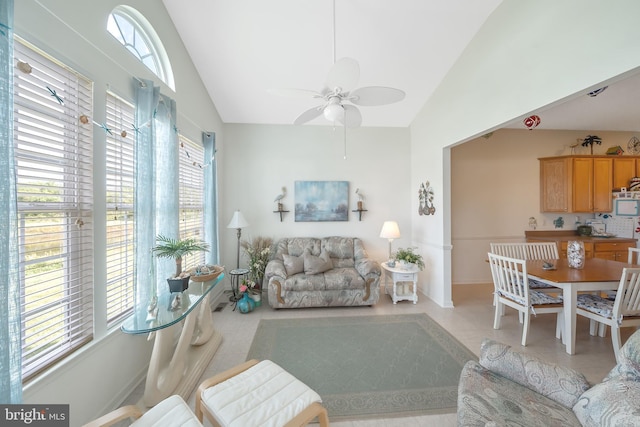 living room with lofted ceiling and ceiling fan