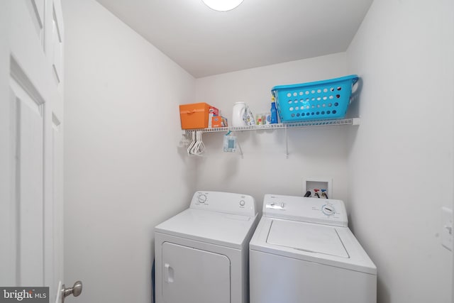 laundry area with washer and dryer