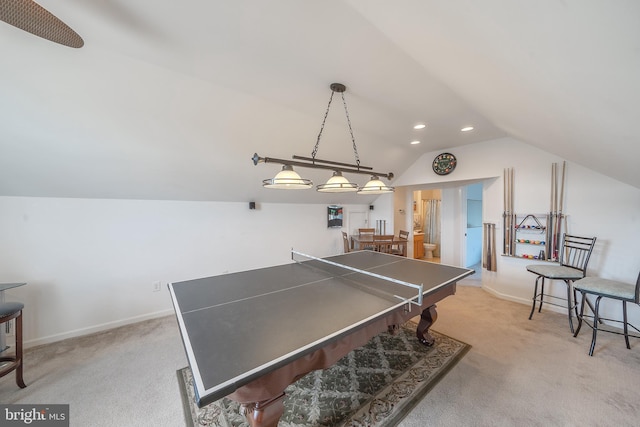 game room with lofted ceiling and light carpet