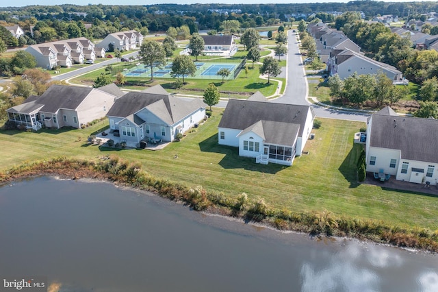 bird's eye view with a water view