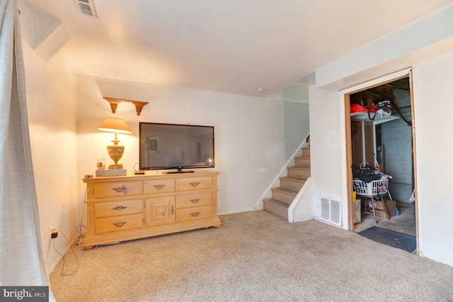 basement featuring light carpet