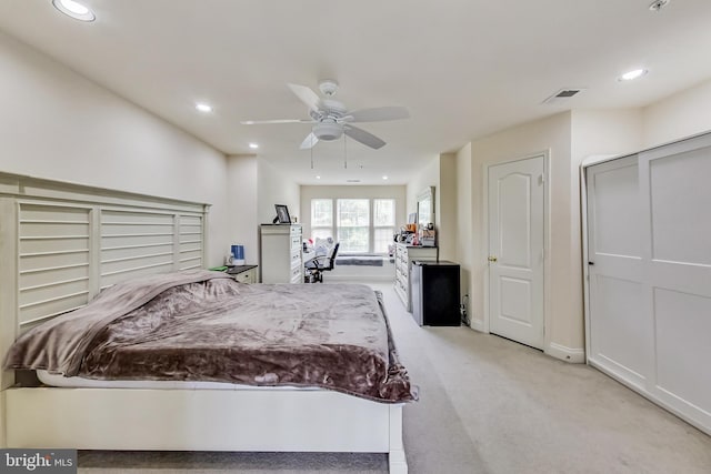 carpeted bedroom featuring ceiling fan