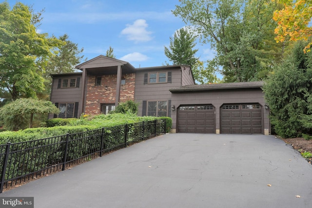 view of front of property featuring a garage