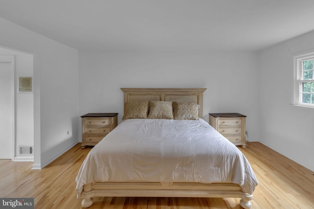 bedroom featuring light hardwood / wood-style floors