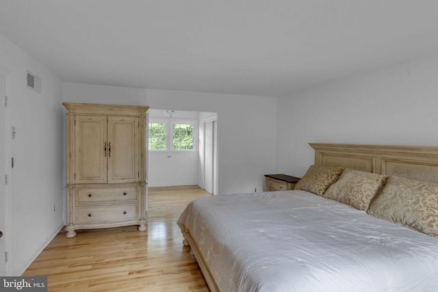 bedroom featuring light hardwood / wood-style flooring