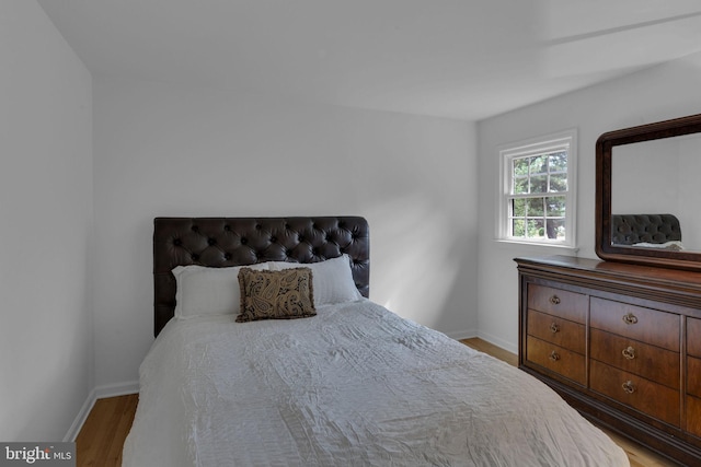 bedroom featuring hardwood / wood-style flooring