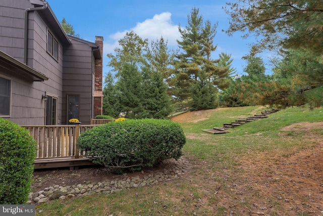 view of yard with a deck