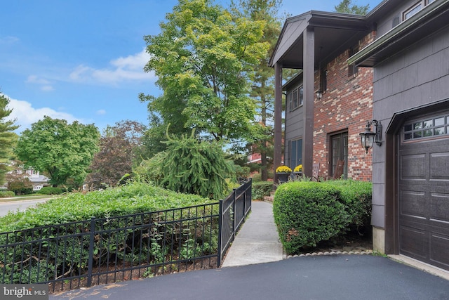 exterior space with a garage