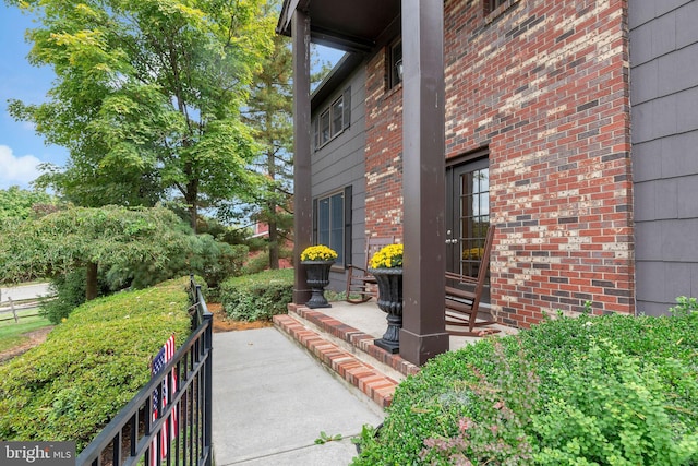 property entrance with a patio area